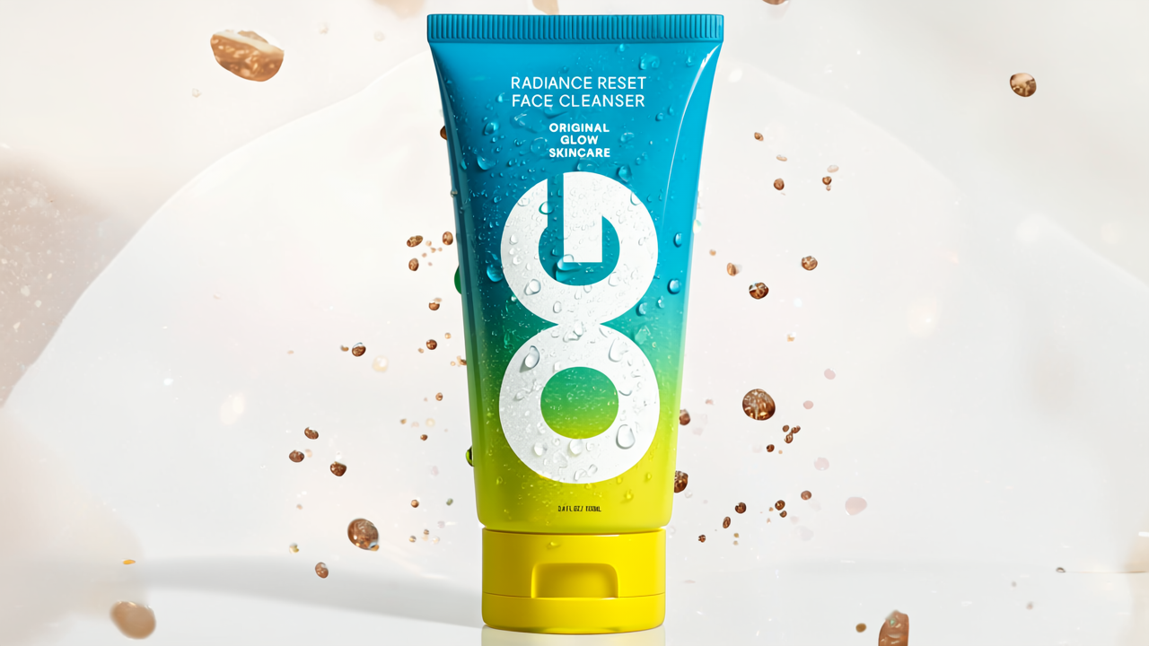 Tube of face cleanser with gradient design on a light background